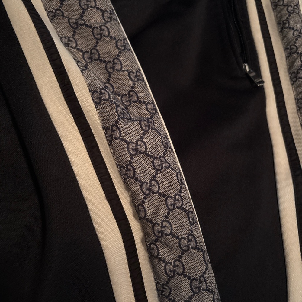 Gucci Black Garment with Logo Tag